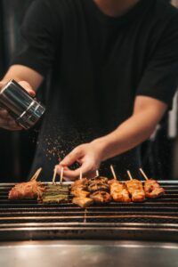 meat grilling on a skewer